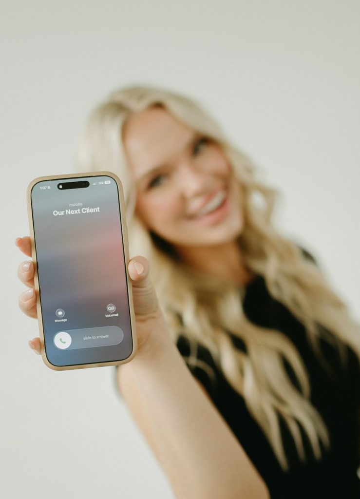 Phone showing an incoming call from Our Next Client