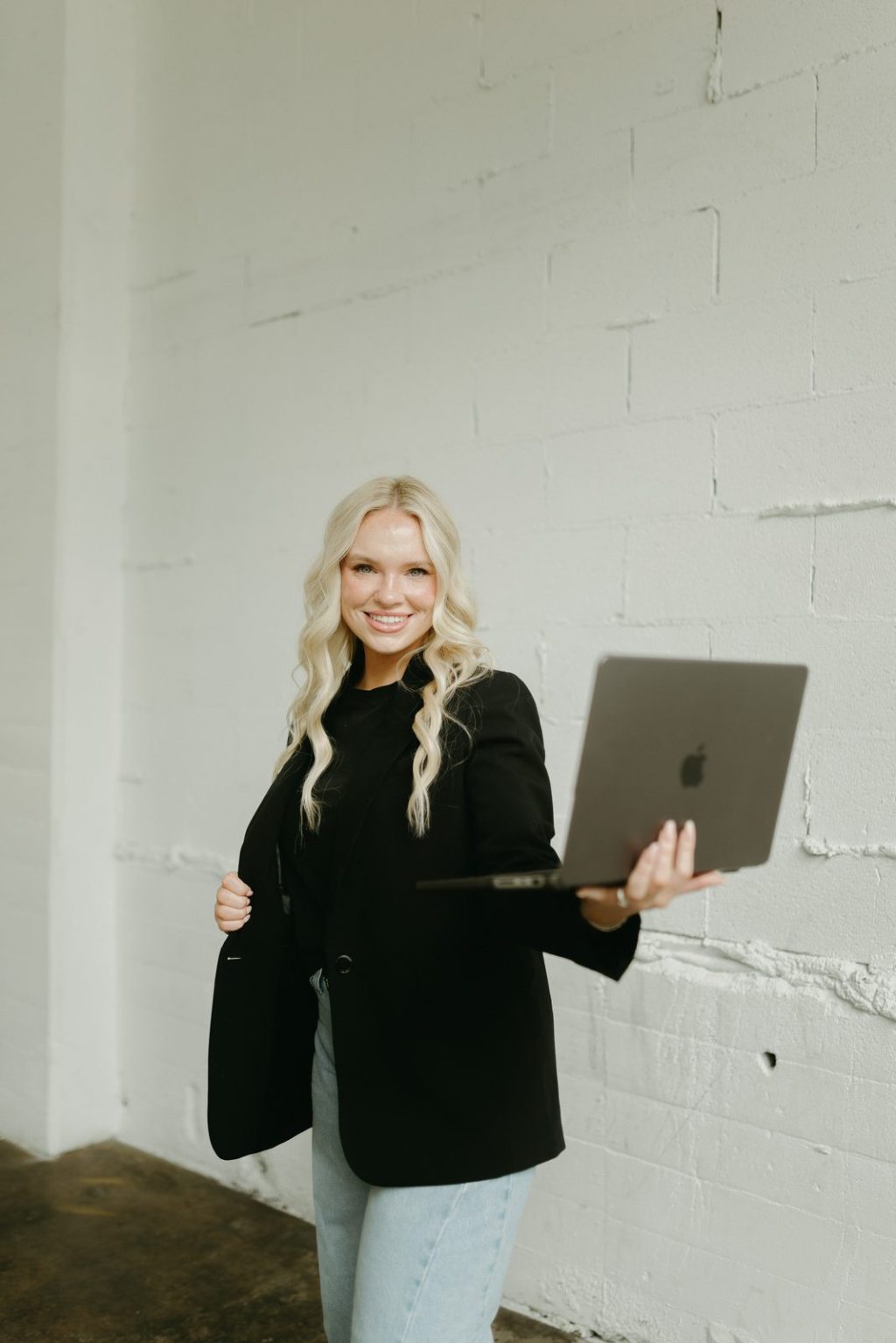 Riley Button with her laptop